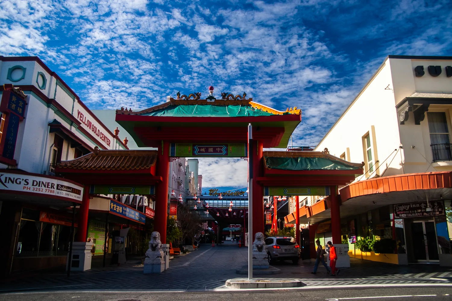 Brunswick Street Mall in Fortitude Valley at night, with bar signs lit