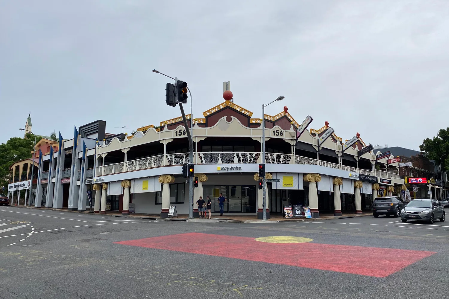 Shopfronts and street trees on Boundary Street in West End, Brisbane