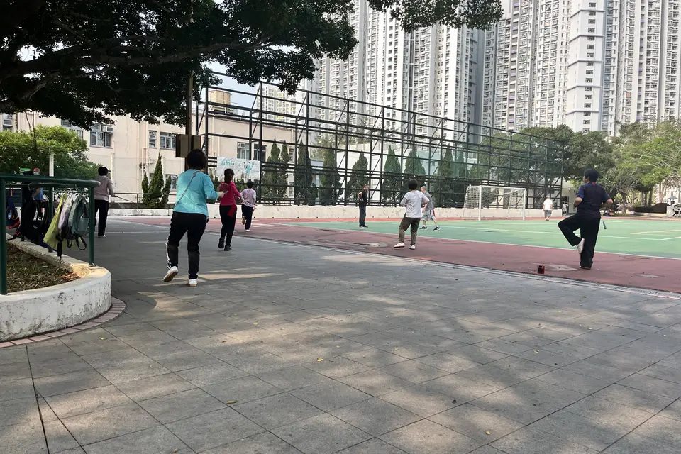 People exercising in Shek Kip Mei Park early in the morning