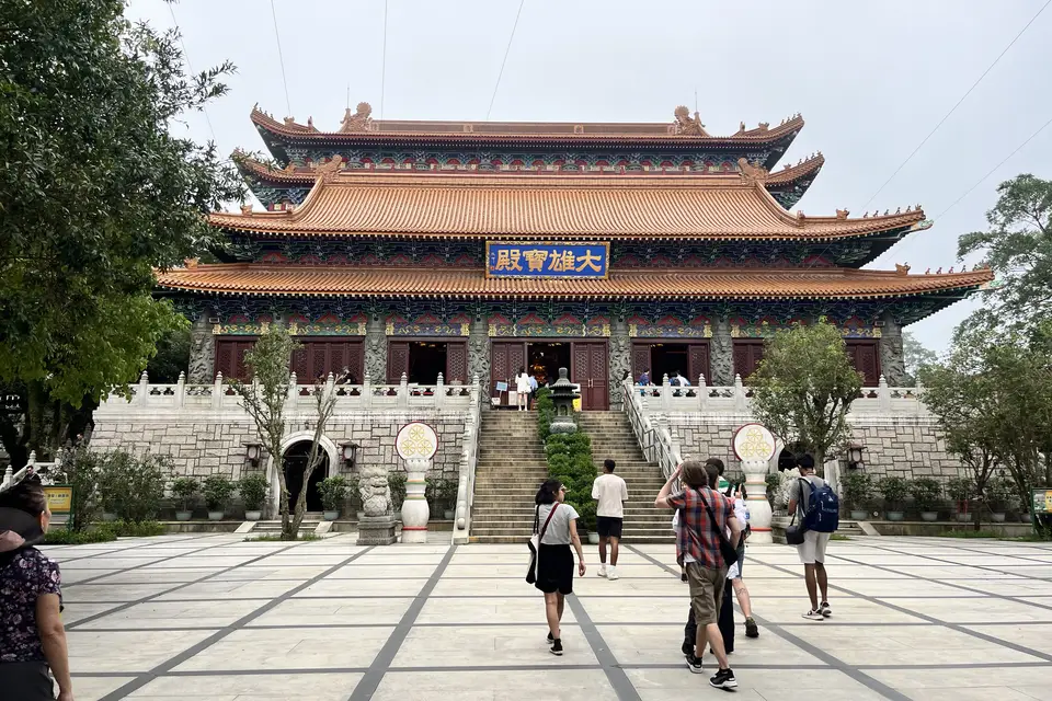 The Grand Hall of Po Lin Monastery across its stone courtyard