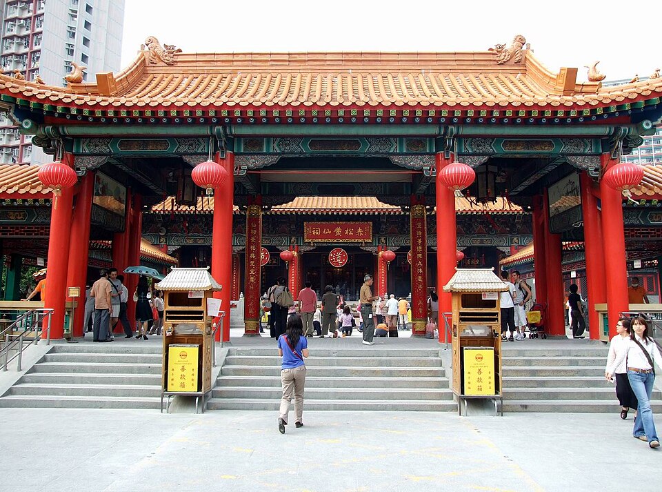 The main hall of Wong Tai Sin Temple at the top of its steps